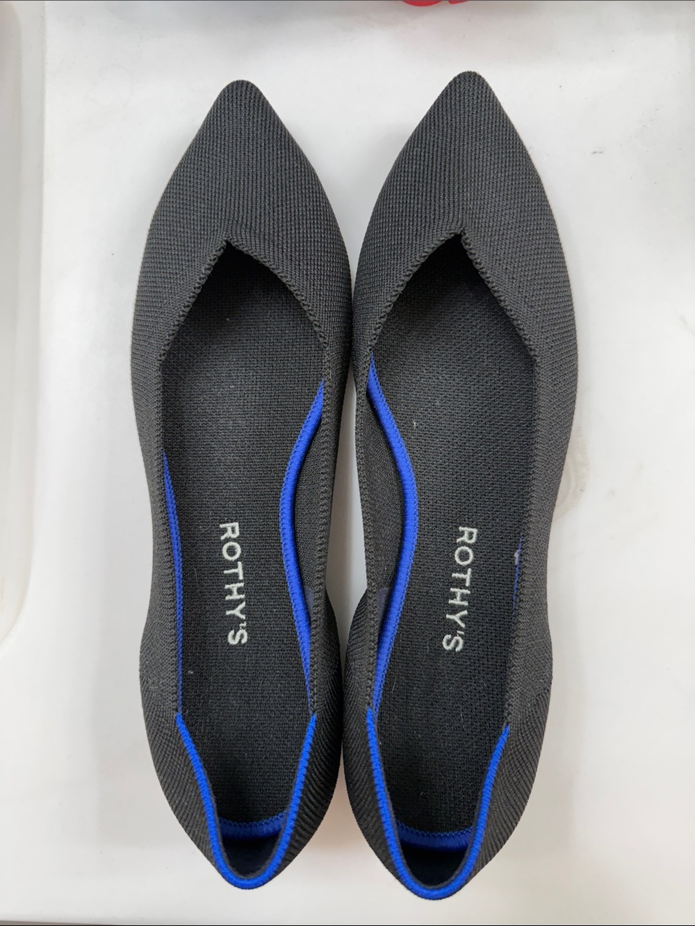 Rothy's Black Pointed Knit Flats with Blue Trim